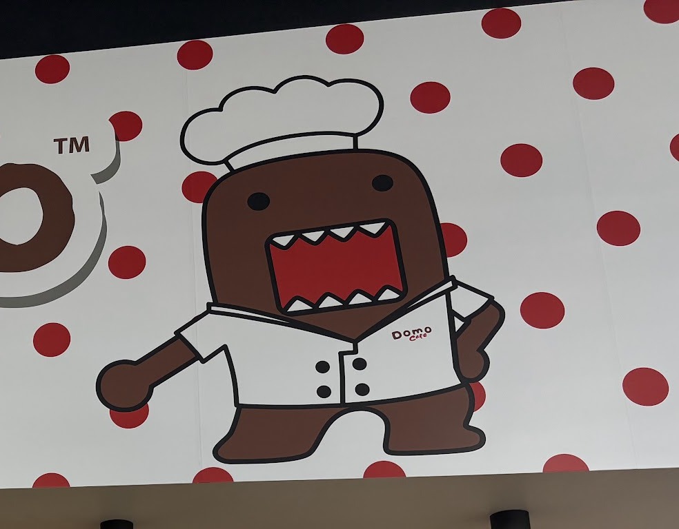 Jumping Chef Domo mural on the wall at Domo Cafe Buena Park